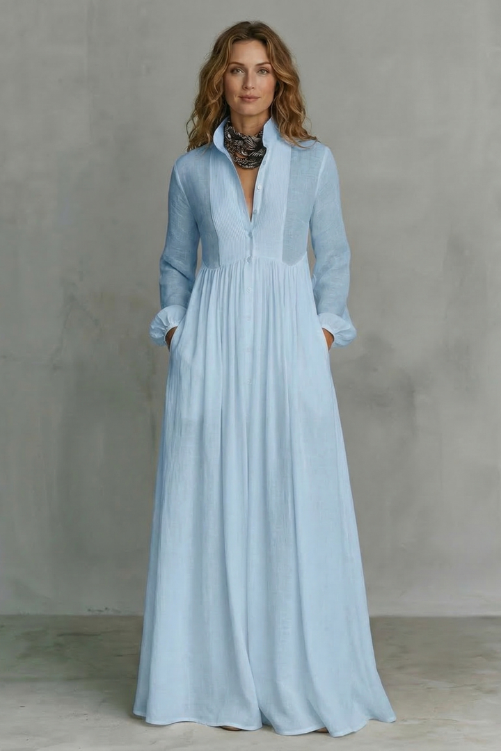 Light blue mandarin-collar button-front maxi dress with long sleeves and flowing skirt