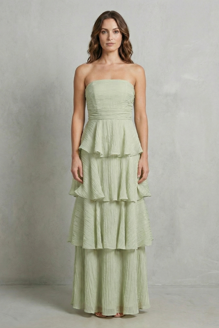 Light green strapless tiered maxi dress with peplum-style ruffle tiers