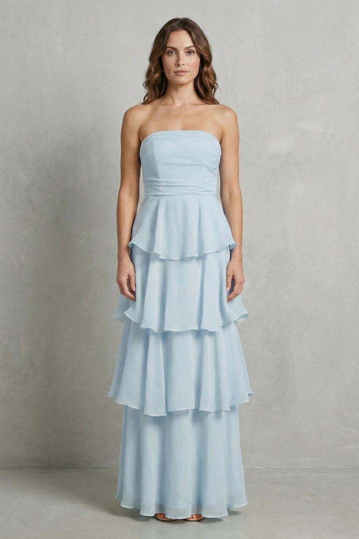 Light blue strapless tiered maxi dress with peplum-style ruffle tiers