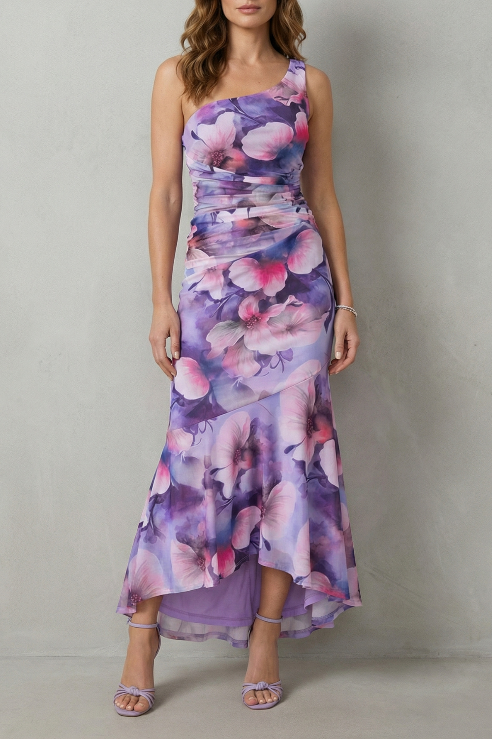 Purple floral one-shoulder maxi dress with ruched bodice and layered flounce hem
