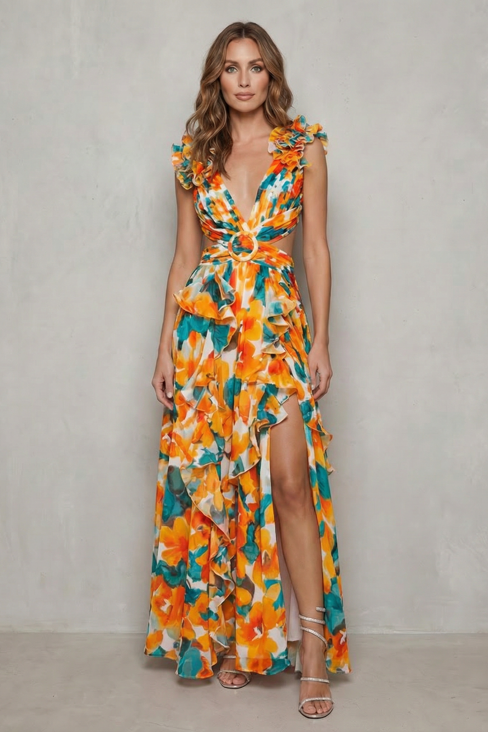 Floral ruffle maxi dress in orange and teal floral print with V-neck, ruffled shoulders, side slit