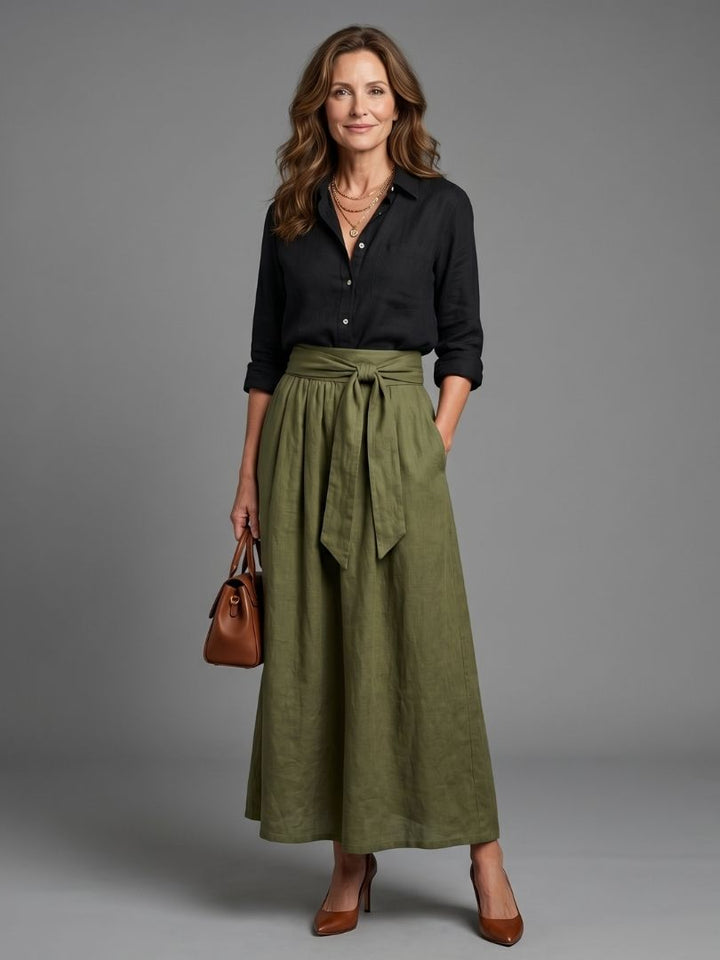Women’s maxi skirt set with black button-front blouse and olive tie-waist long skirt