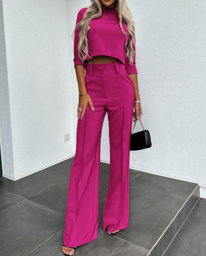 Fuchsia layered two-piece set with cropped top and high-rise wide-leg trousers