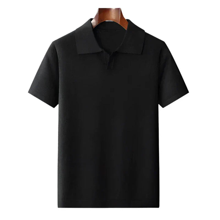 Black classic cotton polo shirt with short sleeves and buttonless collar placket
