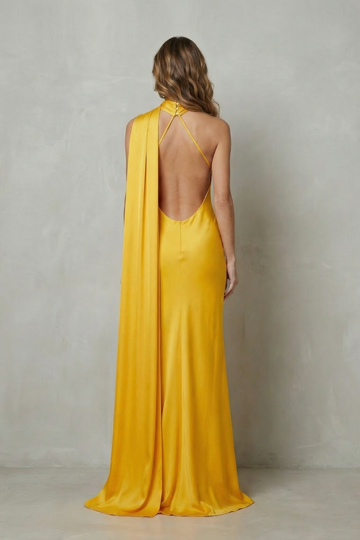 Yellow satin mermaid gown back view with halter tie and open back detail