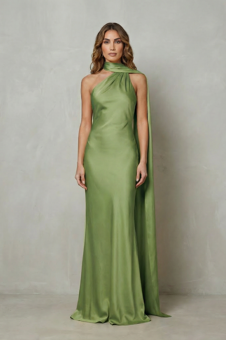 Green satin mermaid gown with sleeveless halter neckline and long flowing side drape