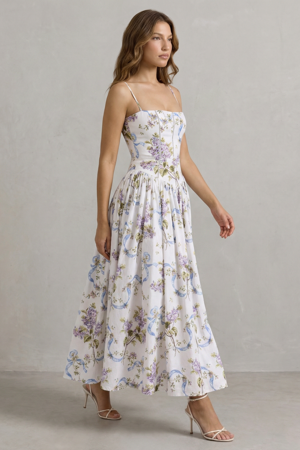 Corset midi dress side view, spaghetti straps, white with purple floral tiered skirt