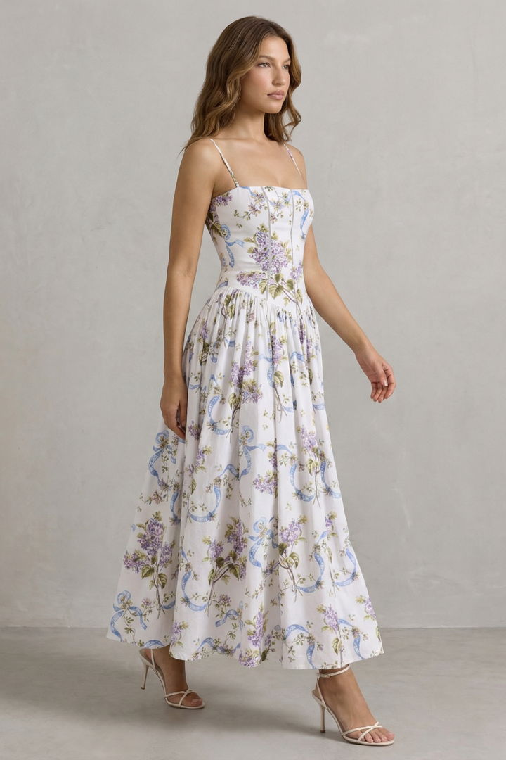 Corset midi dress side view, spaghetti straps, white with purple floral tiered skirt