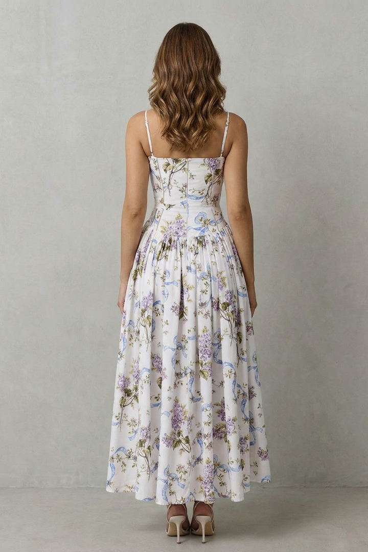Corset midi dress back view, spaghetti straps, white with purple floral tiered skirt