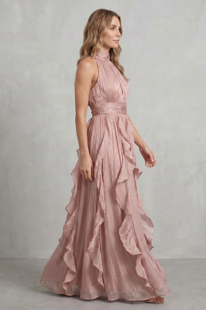 Light pink sleeveless halter ruffle maxi dress with layered, draped skirt