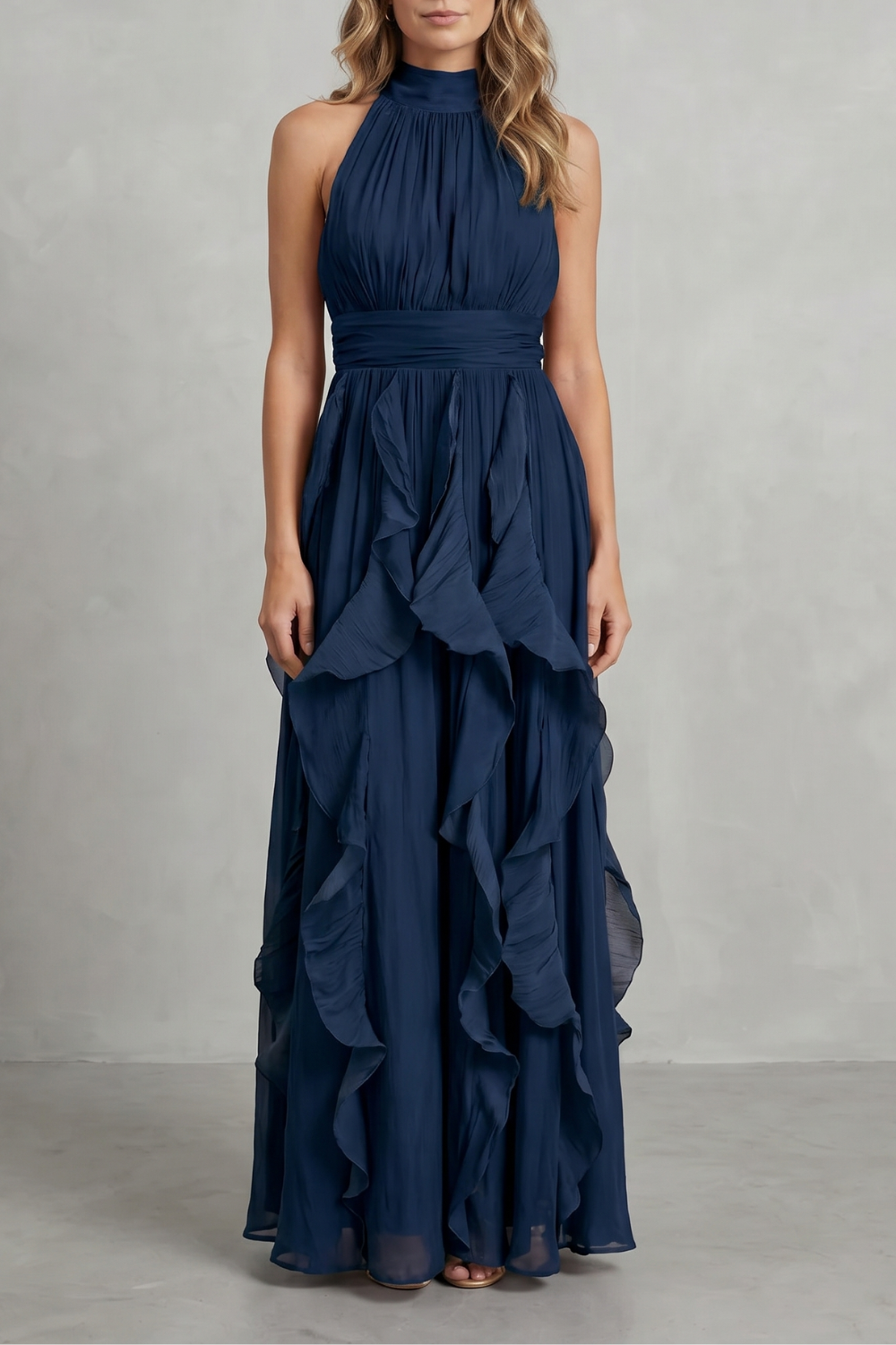 Navy ruffle maxi dress with sleeveless halter, smocked bodice, and tiered skirt