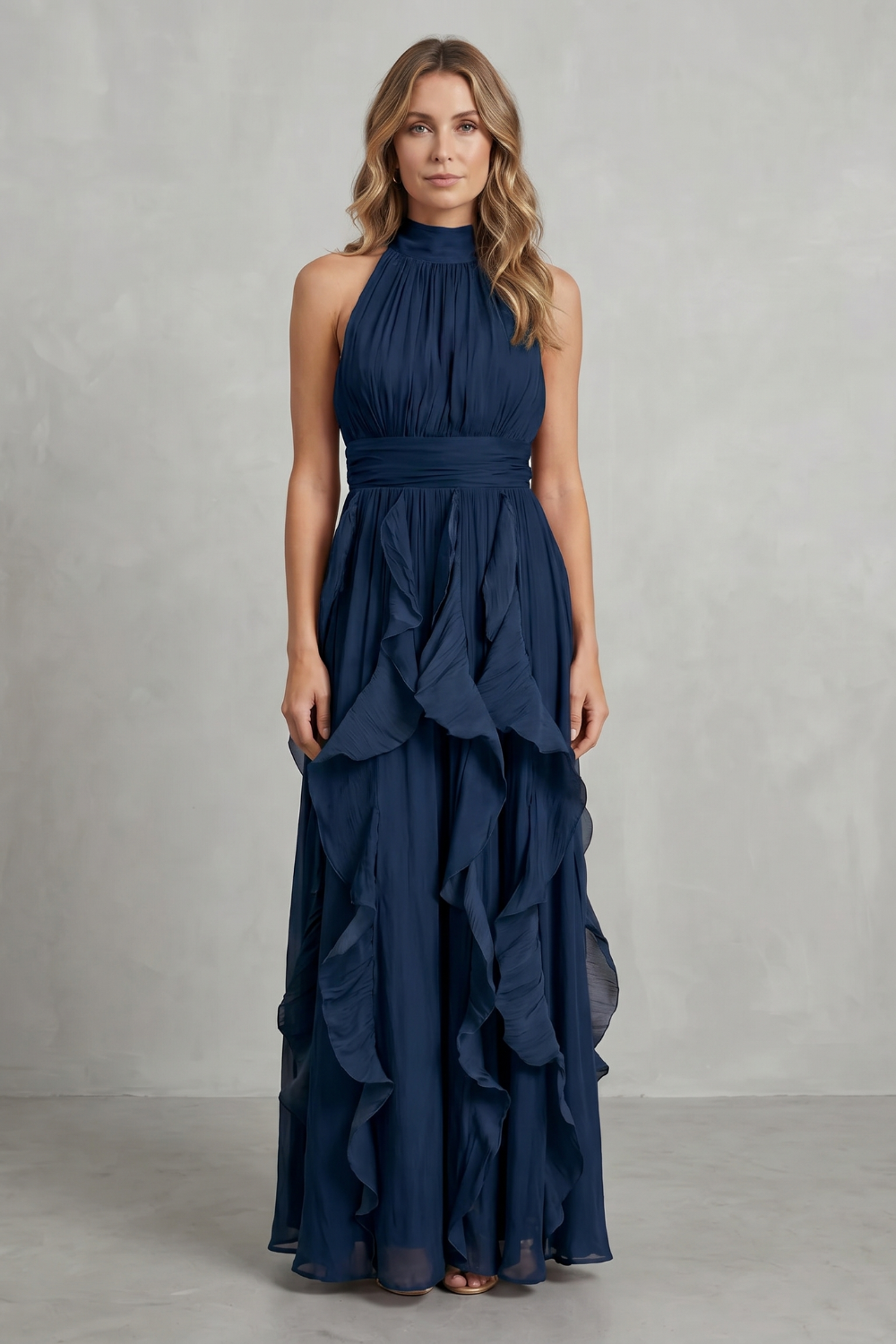 Navy ruffle maxi dress with high halter neck and draped layered skirt