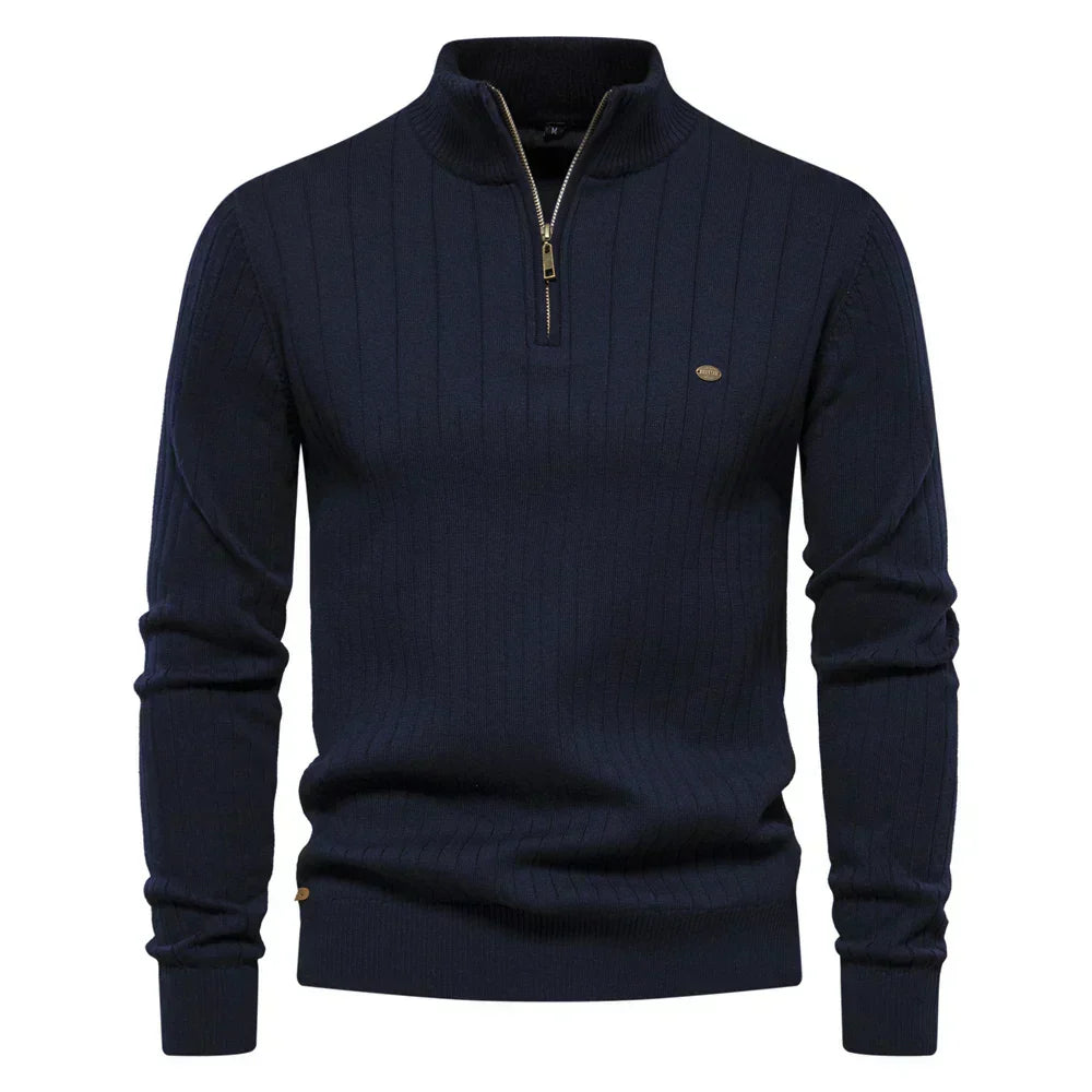 Navy ribbed knit quarter-zip sweater with mock neck and long sleeves