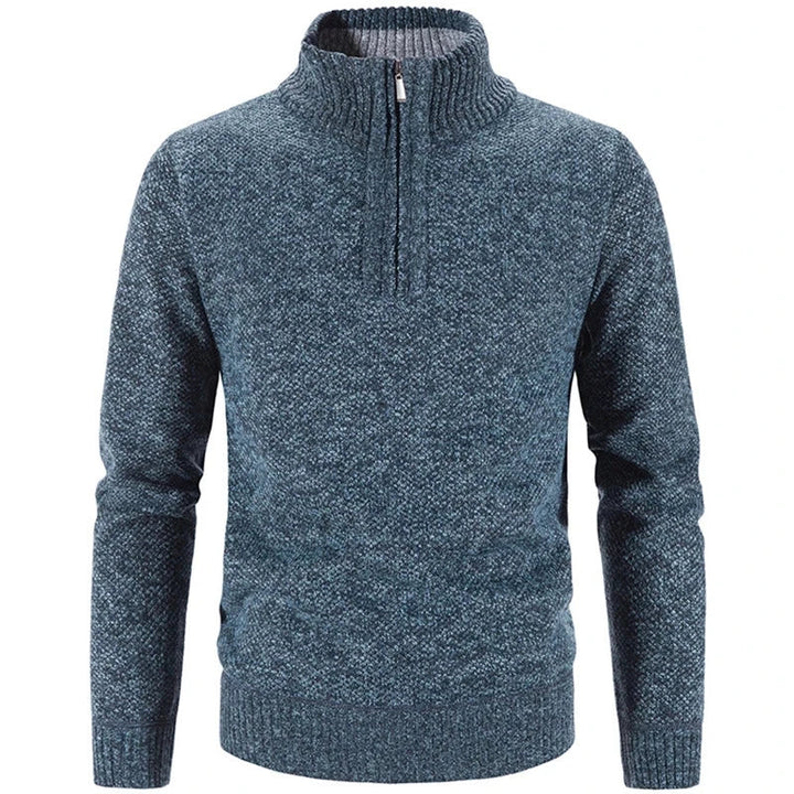 Blue knit half-zip sweater with ribbed stand collar, cuffs, and hem.