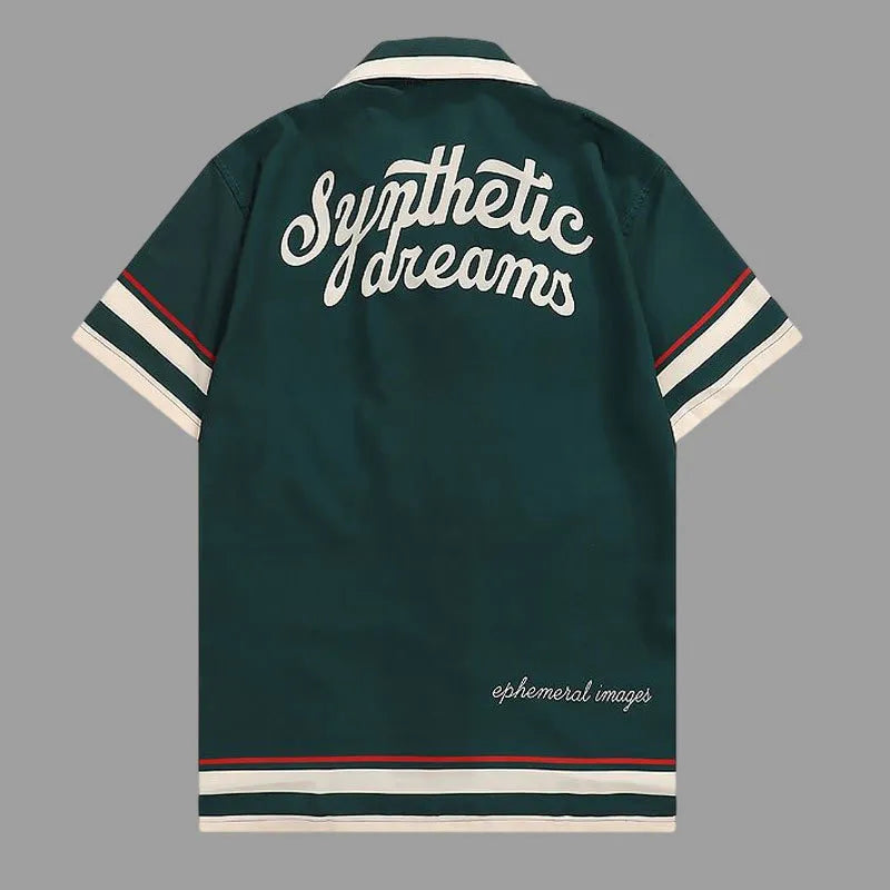 Dark green polo shirt back with bold white text graphic and red-and-cream striped hem