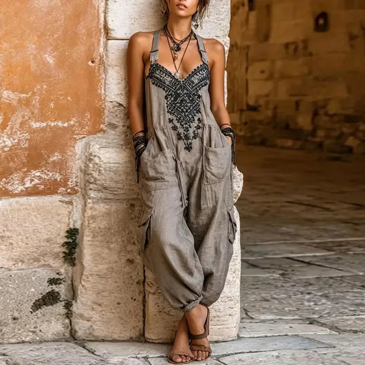 Grey bohemian jumpsuit with embroidered V neckline and wide cargo pockets