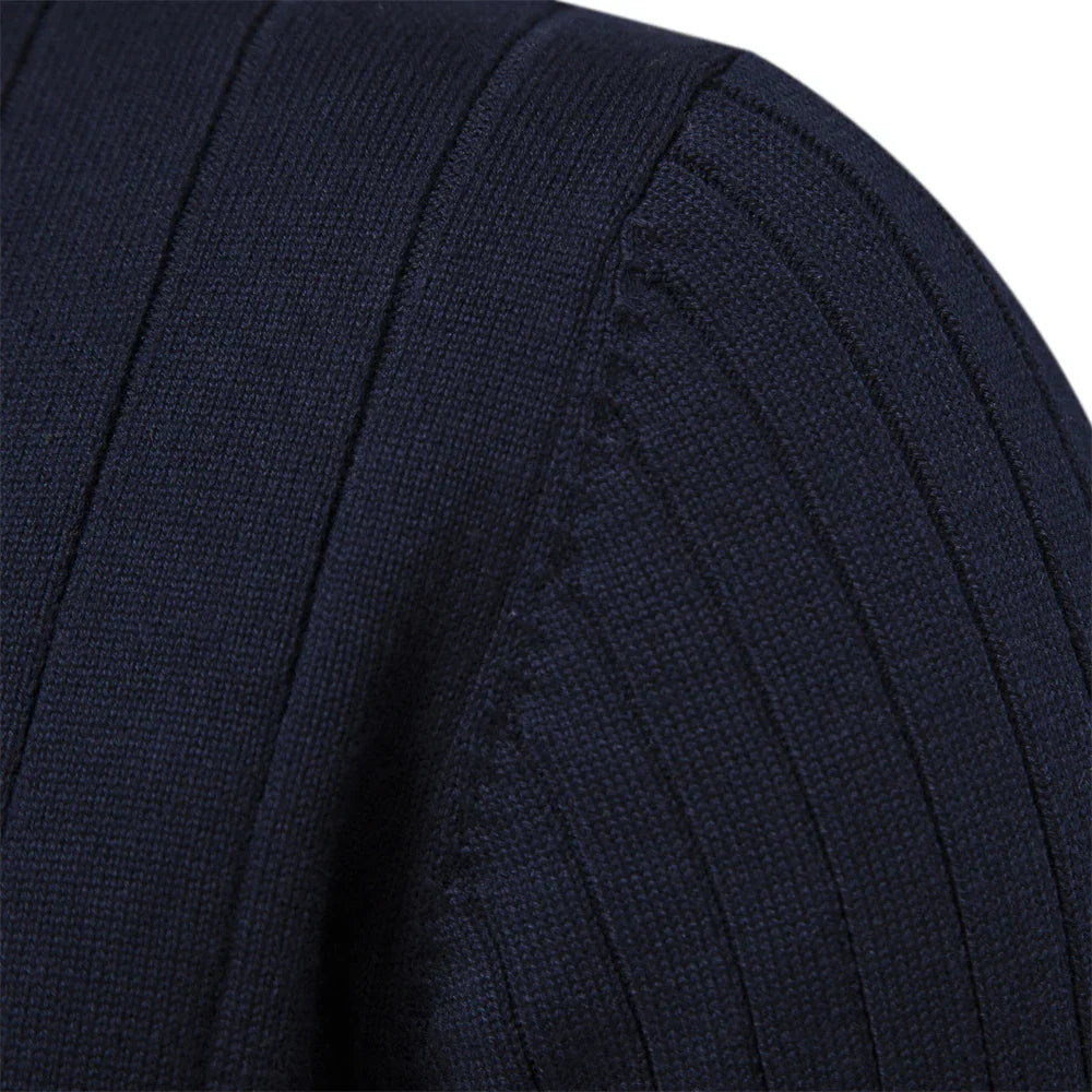 Navy ribbed knit sweater sleeve texture close-up