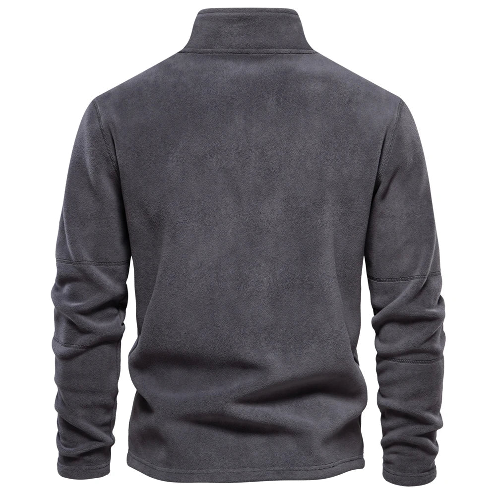 Men's quarter-zip windbreaker jacket, dark gray fleece, back view with stand collar