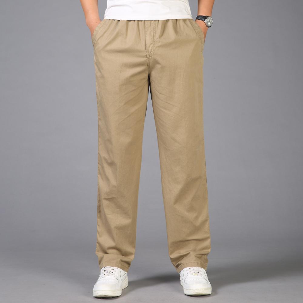 Khaki linen pants with elastic waist and tapered straight legs