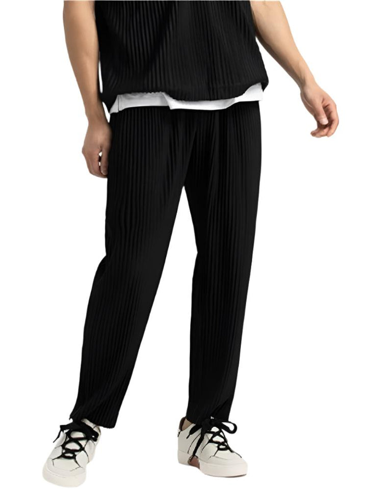 Black corduroy cotton pants with vertical ribbed texture, straight leg, ankle length