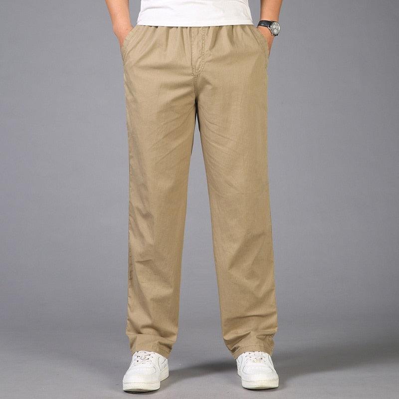 Khaki linen pants with elastic waistband and tapered straight legs