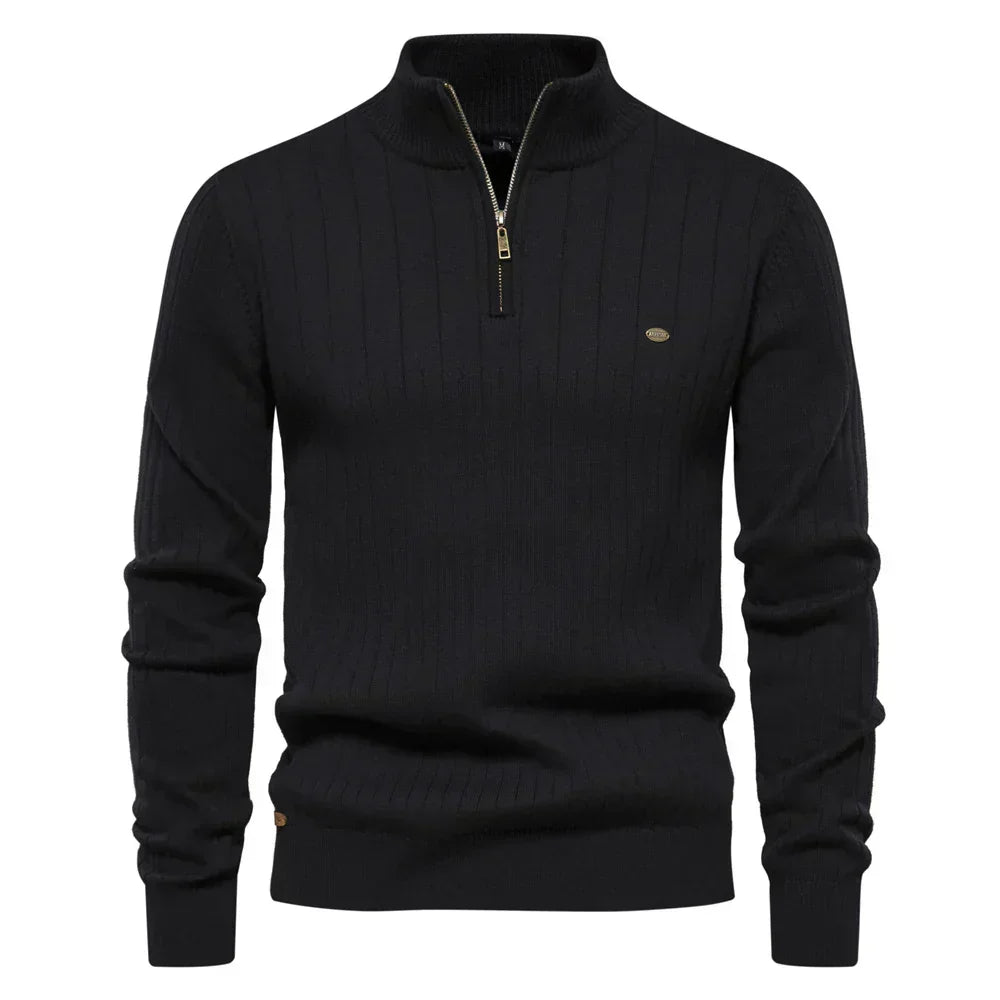 Black ribbed knit quarter-zip sweater with mock neck and long sleeves