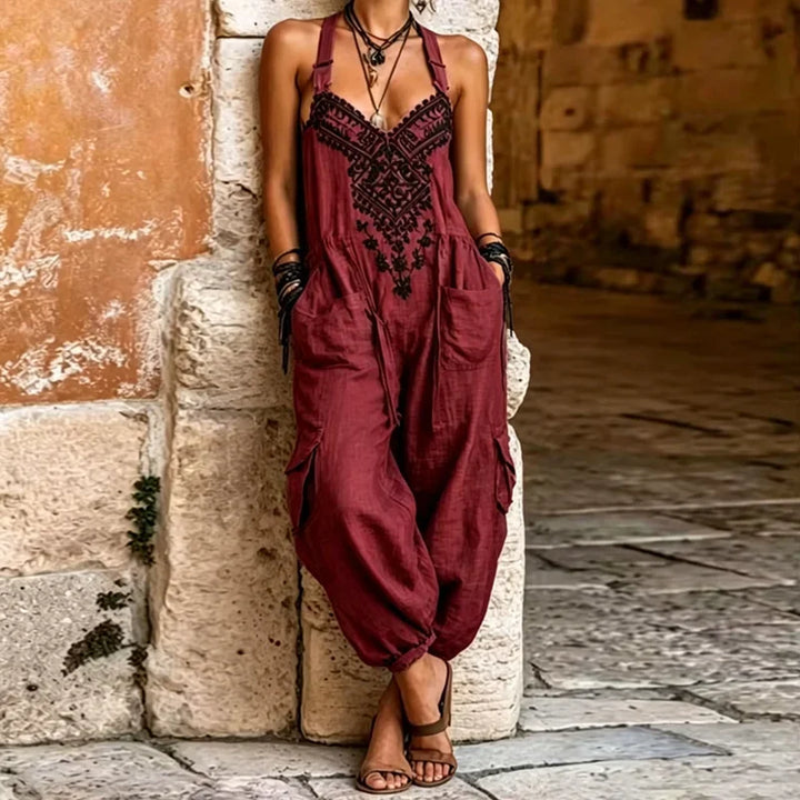 Wine red bohemian jumpsuit with black embroidered trim and roomy cargo pockets