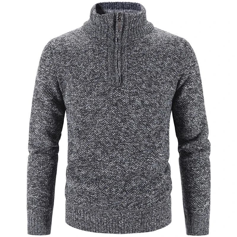 Gray knit half-zip sweater with textured pattern and ribbed hem and cuffs.