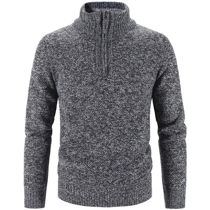 Gray knit half-zip sweater with textured pattern and ribbed hem and cuffs.
