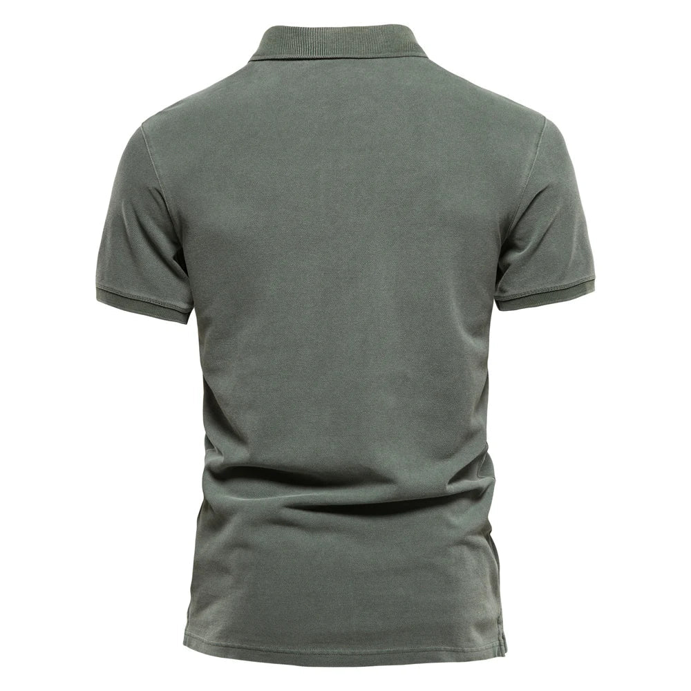 Men's green polo shirt, back view with short sleeves and ribbed collar