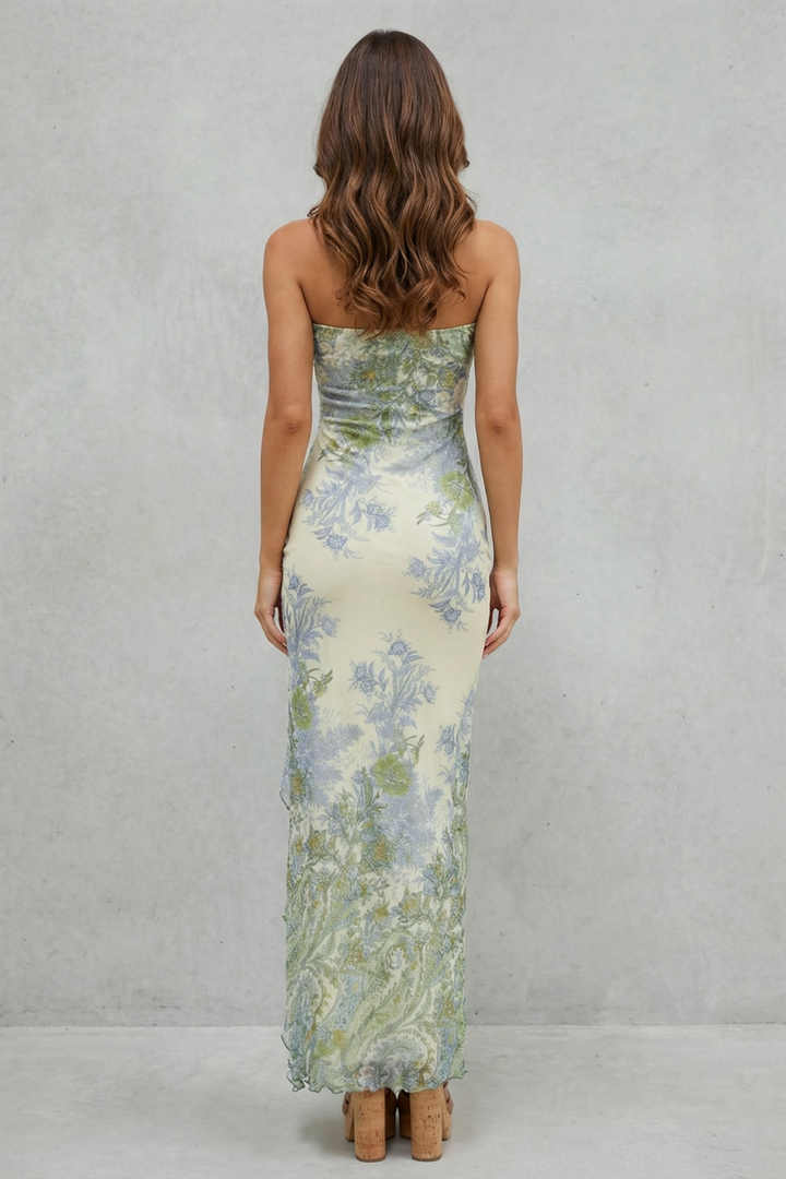 Women's strapless maxi dress, back view in cream floral print with ruffled hem