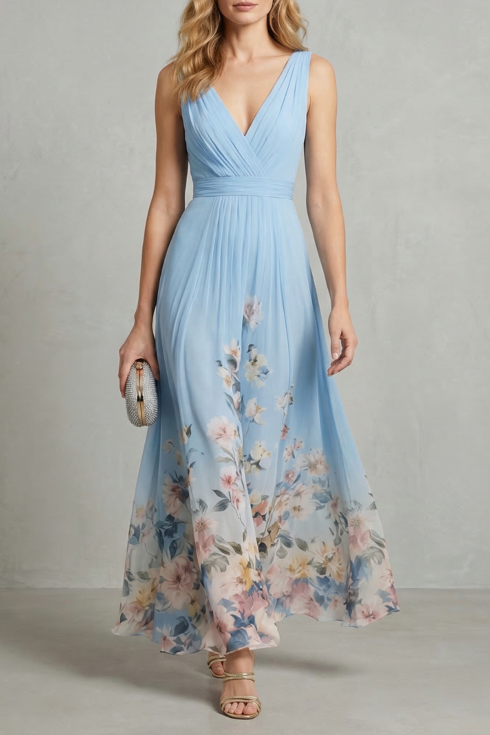 Light blue maxi dress with V-neck, pleated waist and floral print
