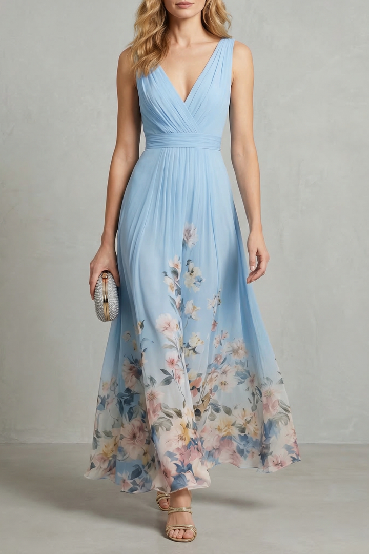Light blue maxi dress with V-neck, pleated waist and floral print