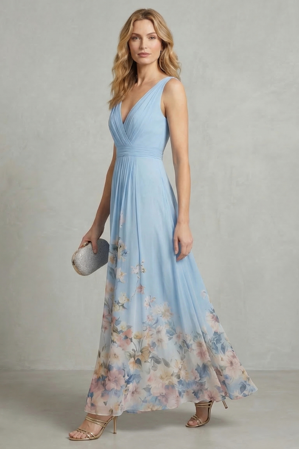 Light blue sleeveless V-neck pleated maxi dress with floral hem detail