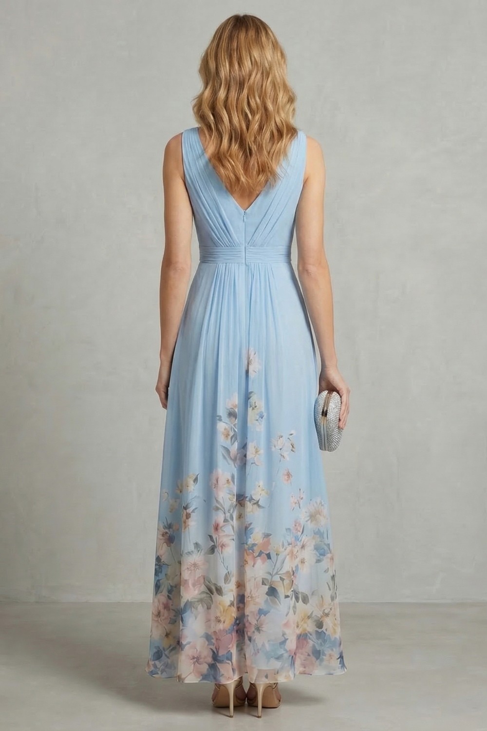 Back view of light blue sleeveless V-neck pleated maxi dress with floral print