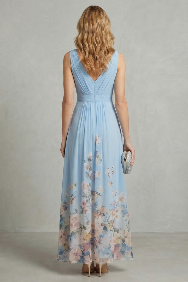 Back view of light blue sleeveless V-neck pleated maxi dress with floral print