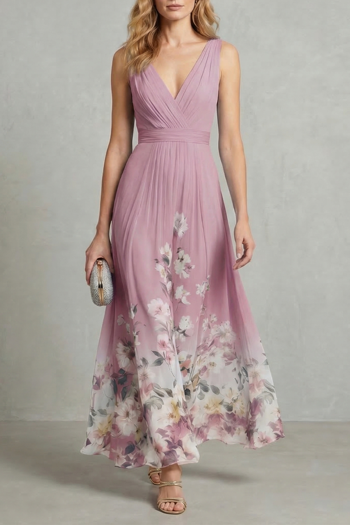 Pink V-neck pleated maxi dress with floral print and sleeveless bodice