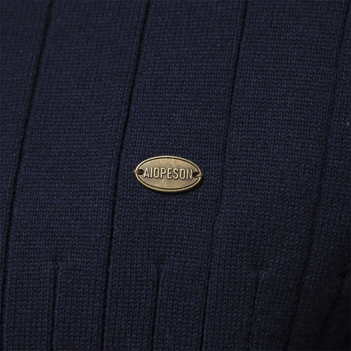 Navy sweater chest logo patch on ribbed knit fabric