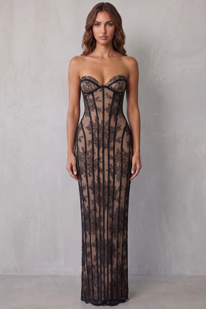 Black lace maxi dress with open back and racerback straps, vertical lace panels, long fit