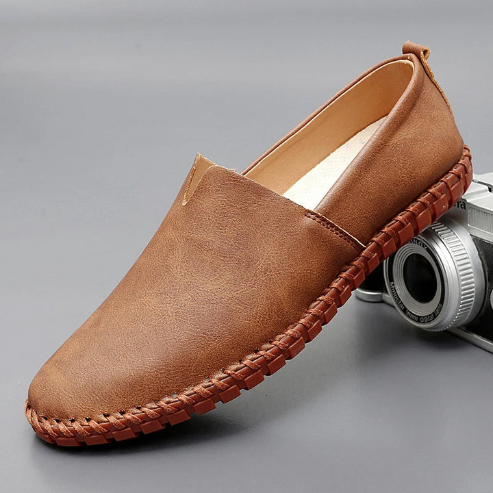 Chestnut-brown stitch loafer with contrast braided welt and moc seams