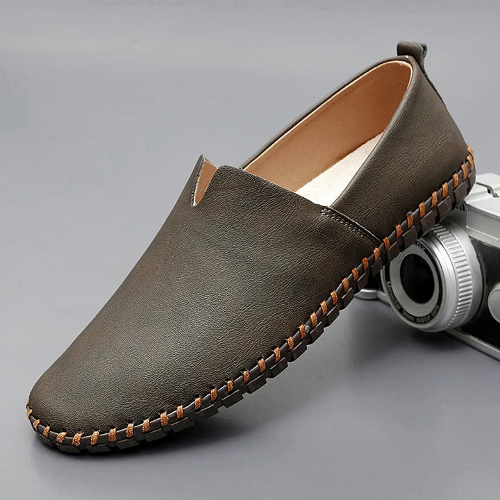 Dark olive stitch loafer with orange-brown contrast welt stitching