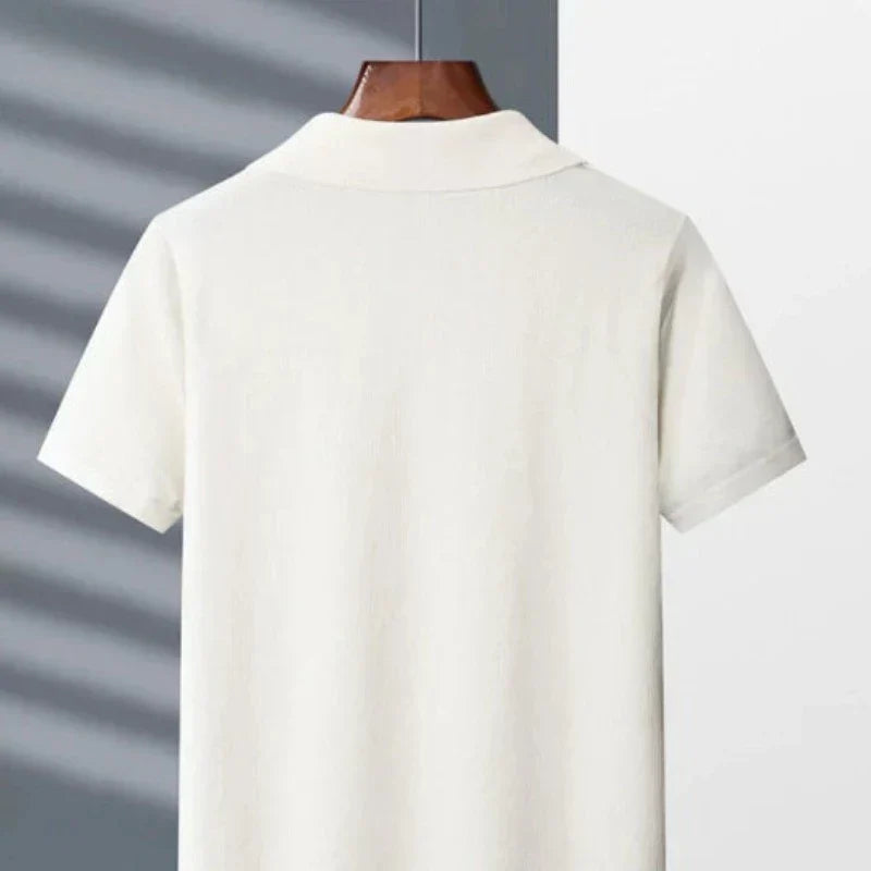 White cotton polo shirt back view with fold-over collar and short sleeves