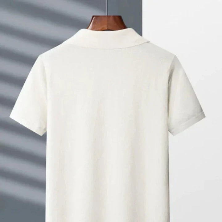 White cotton polo shirt back view with fold-over collar and short sleeves