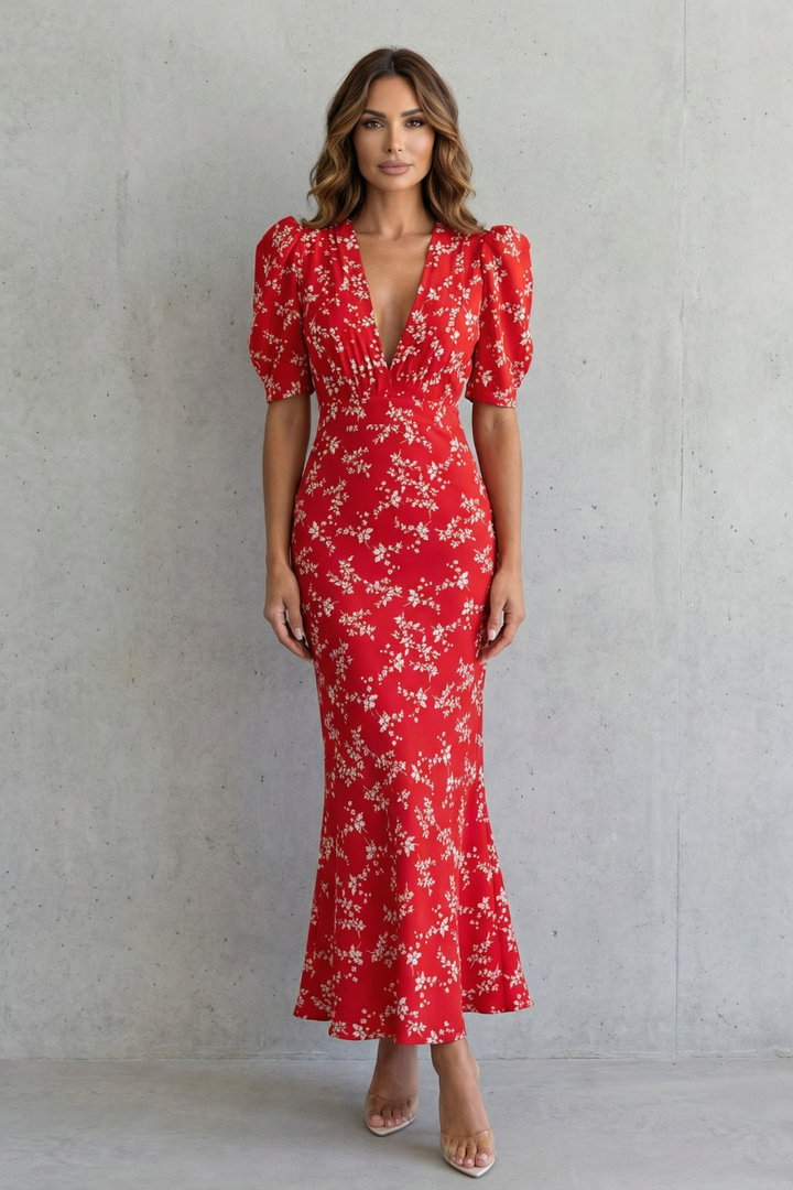 Red floral print maxi dress with V-neck and puff sleeves, fitted waist, flared hem