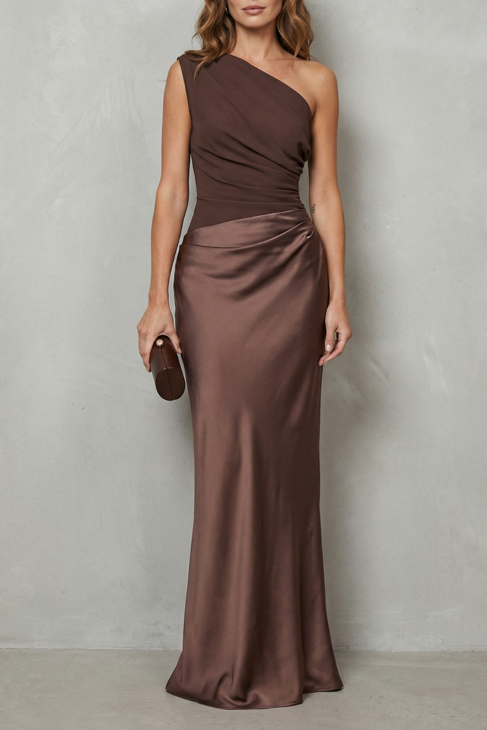 Brown one-shoulder satin evening gown with draped bodice and ruched waist