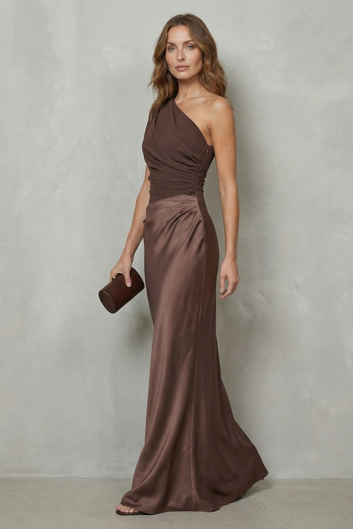 Brown one-shoulder satin evening gown with side drape and long column skirt