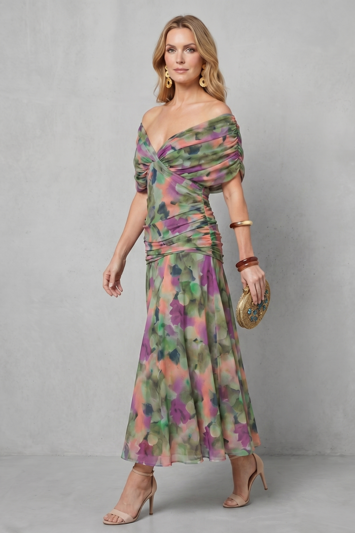 Off-shoulder maxi dress in floral print with twisted bodice and tiered-looking skirt