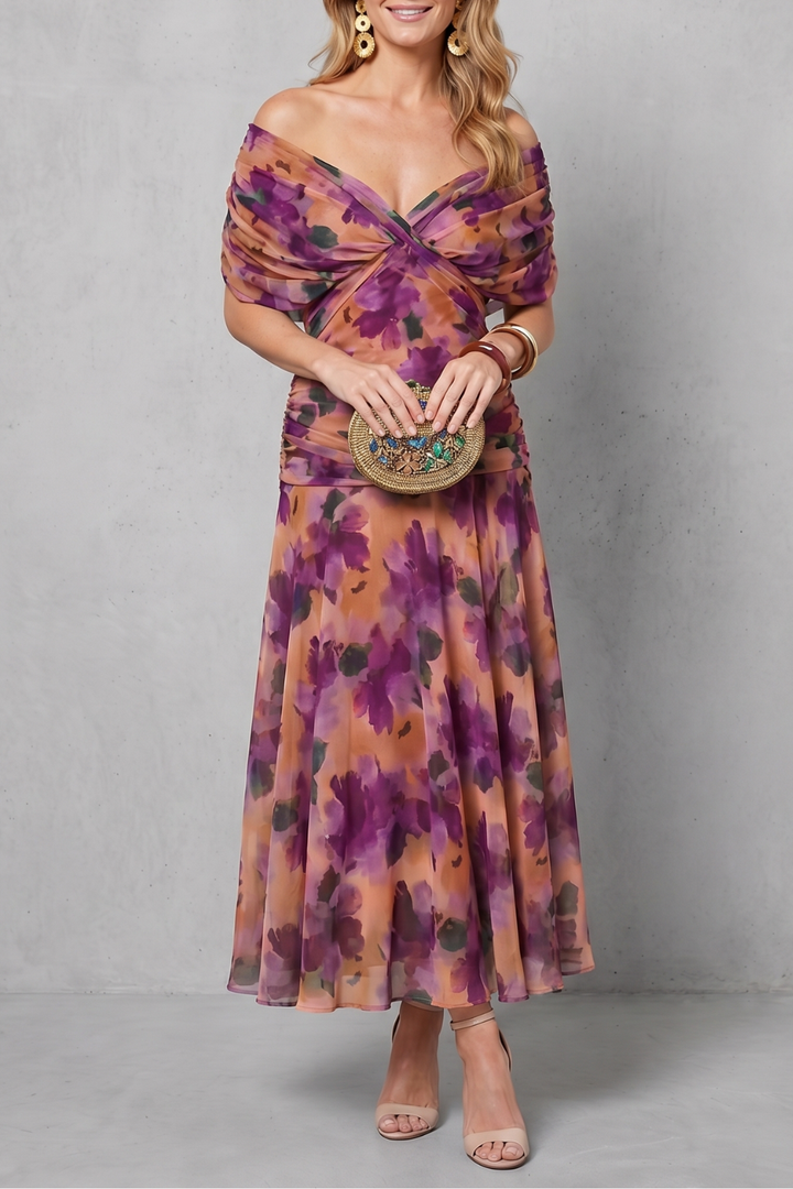 Off-shoulder maxi dress with purple and pink floral print, ruched twist bodice