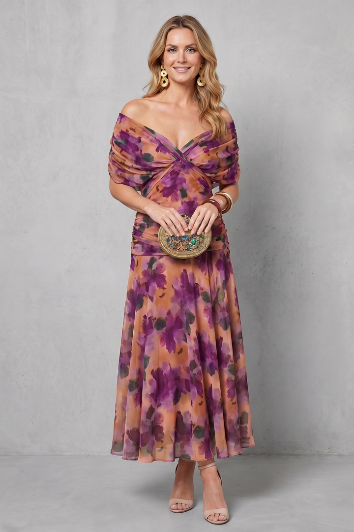 Off-shoulder maxi dress with purple floral print, gathered twist bodice and flowing skirt