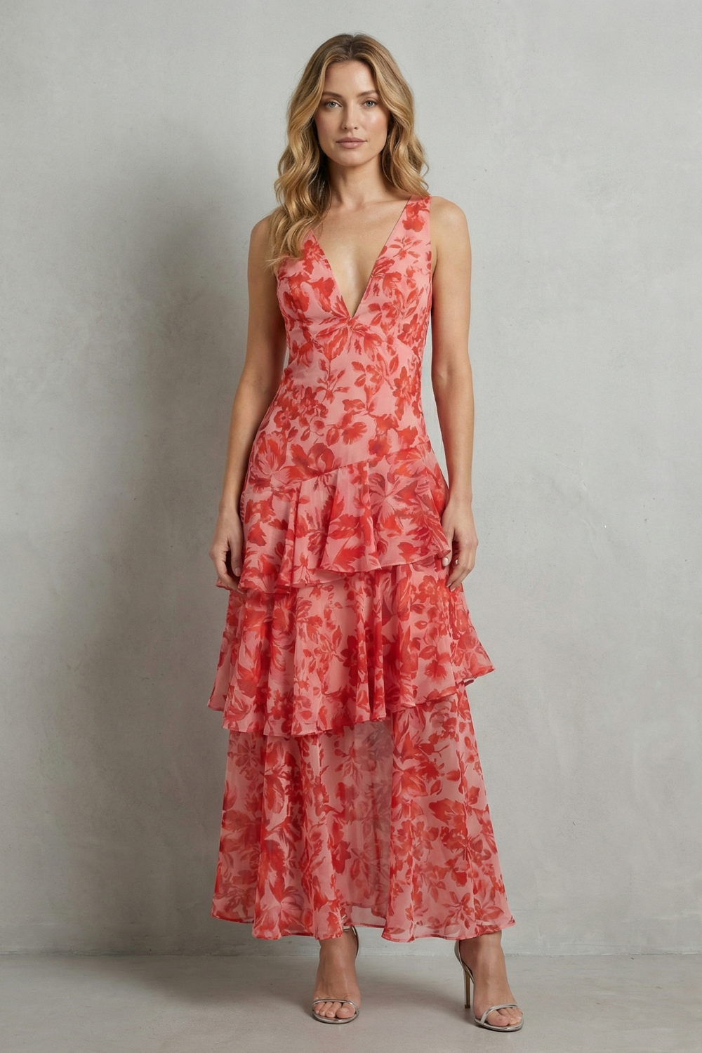 Red-orange chiffon maxi dress with sleeveless V-neck and tiered layers